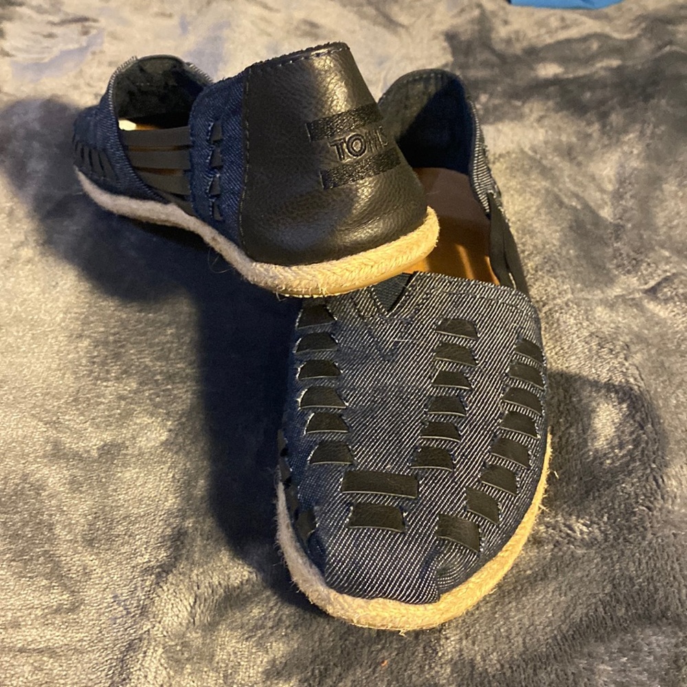 Women’s Toms shoes.